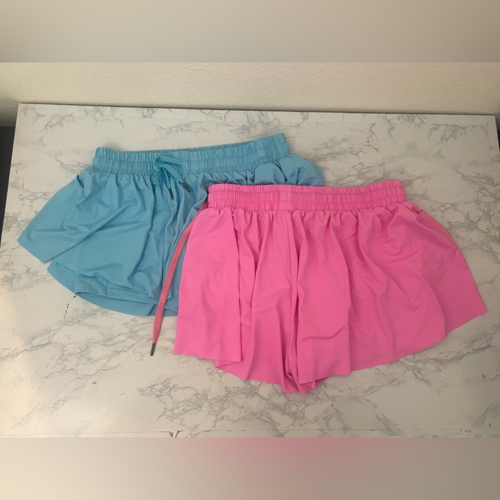 Activewear Womens Shorts with pockets Sz L Blue Pink Layered Lined Lot Of 2